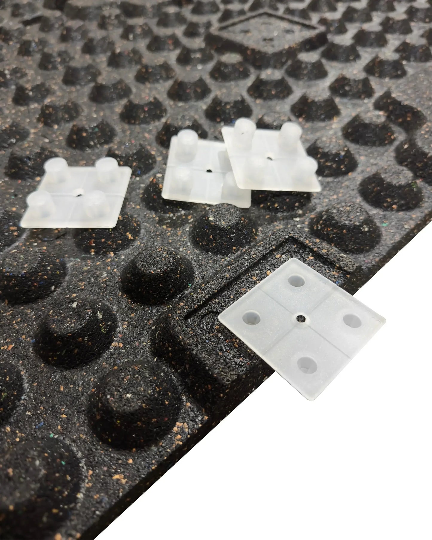 Black rubber gym floor tile with 30mm thickness from Gym Gear, showing interlocking connector blocks for easy installation.