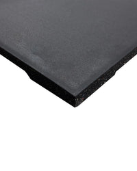 Close-up of a 30mm black rubber gym floor tile corner edge from Gym Gear, showing textured surface and seamless fit.