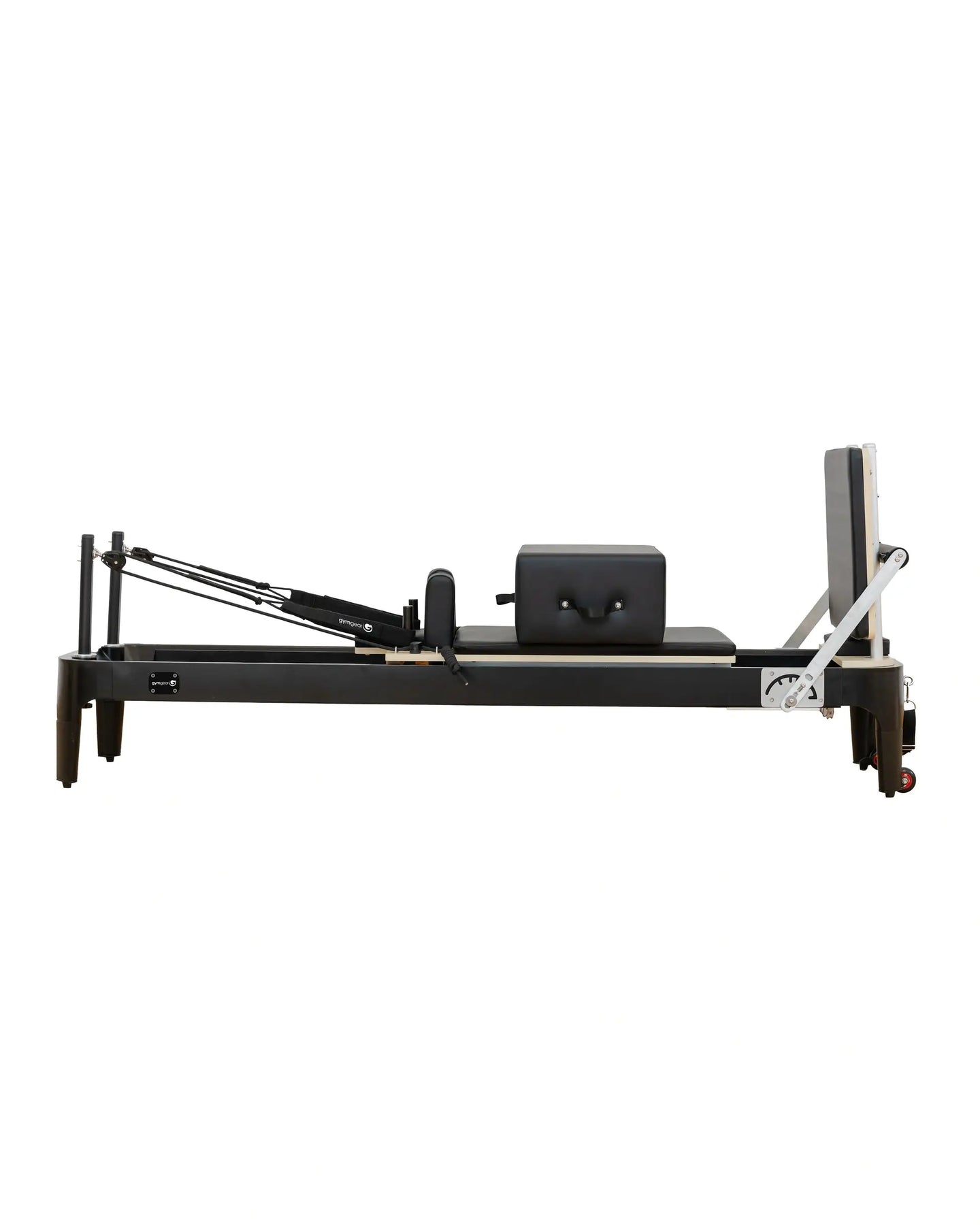 Aluminium Pilates Reformer by Gym Gear showing adjustable resistance springs and padded carriage for Pilates exercise.