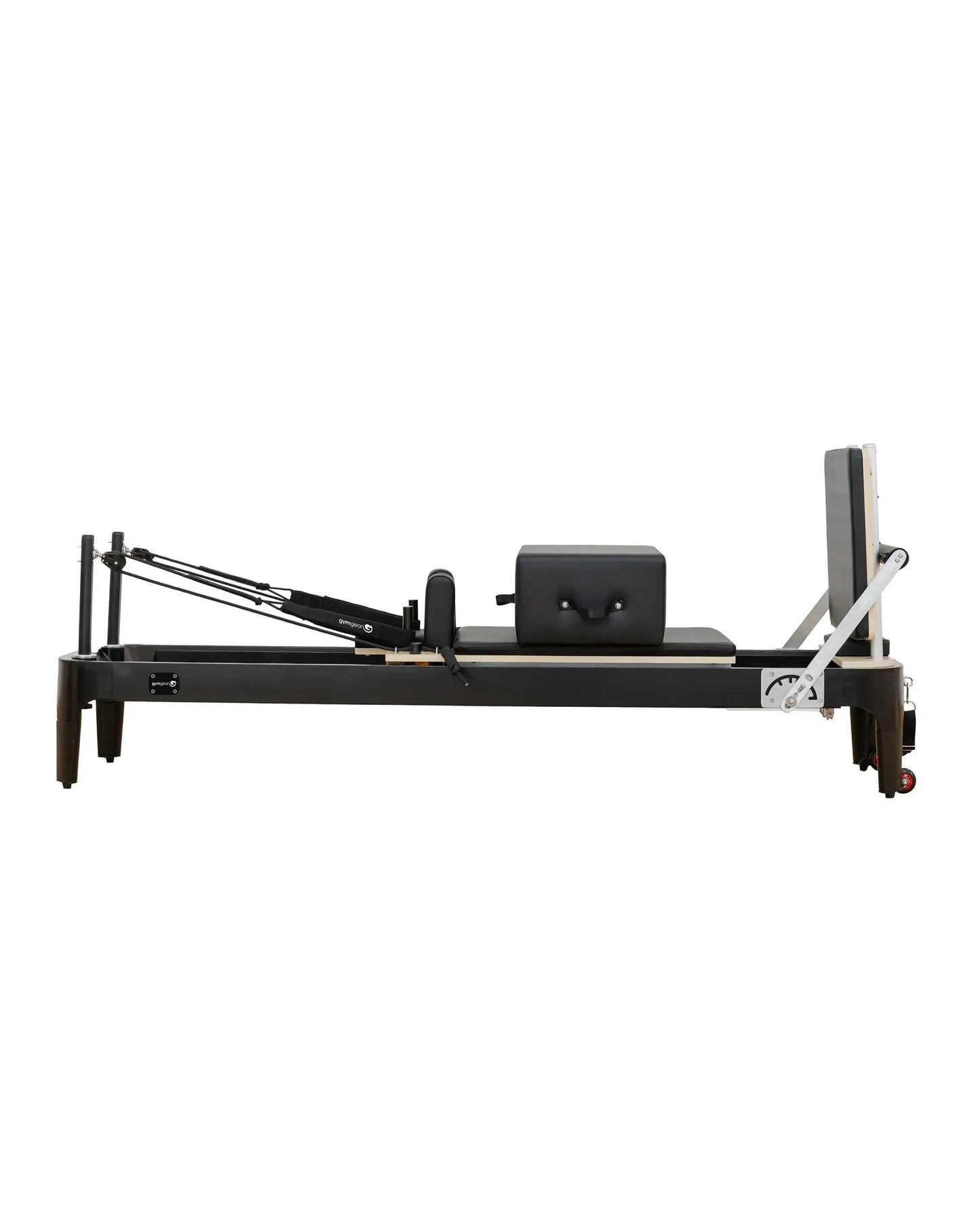 Aluminium Pilates Reformer by Gym Gear showing adjustable resistance springs and padded carriage for Pilates exercise.
