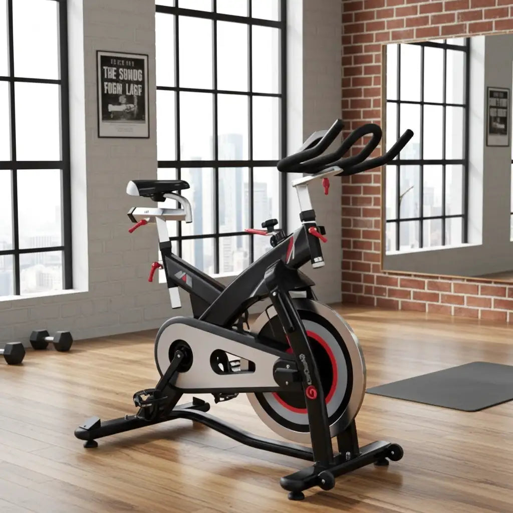 Black and silver stationary exercise bike with red accents on the flywheel.