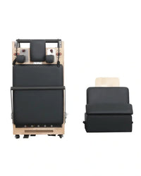 Foldable Oak Reformer by Gym Gear, showing padded carriage, adjustable straps, and sturdy wooden frame for versatile Pilates workouts.