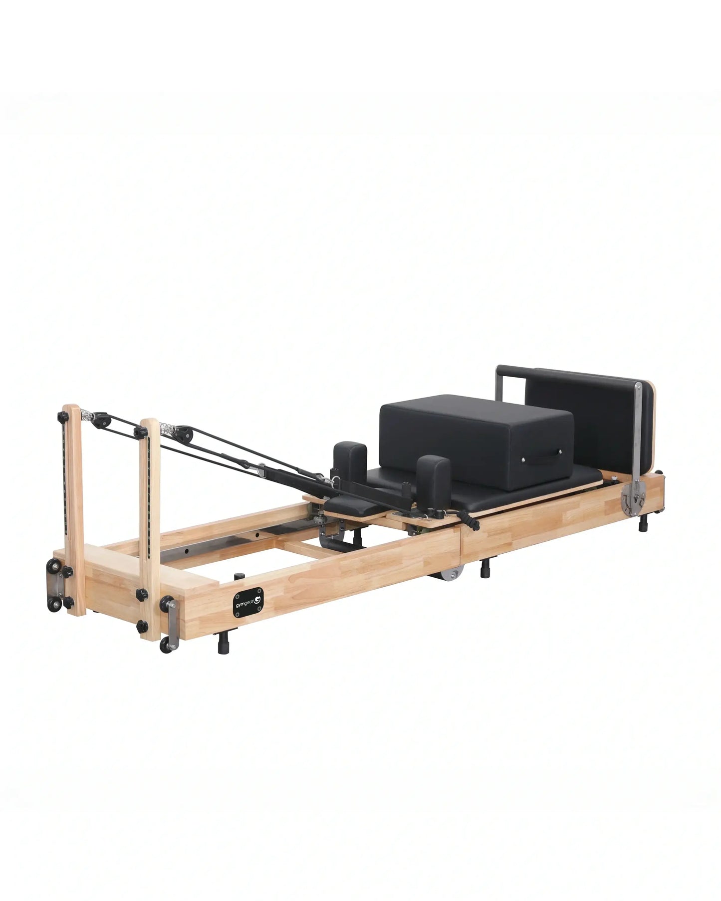 Foldable Oak Reformer by Gym Gear with padded carriage and adjustable resistance for versatile Pilates workouts.