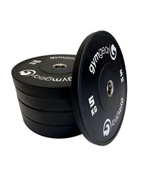 Set of black Gym Gear bumper plates for weightlifting, durable rubber weight plates for gym workouts.