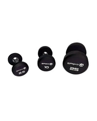 Gym Gear Pro rubber dumbbells with textured handles and colorful ends, displayed on a gym floor.