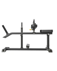 Gym Gear Pro Series plate loaded seated calf raise machine with padded seat and weight plates for calf muscle workouts.